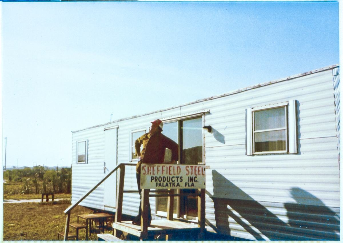 James MacLaren never deserved such a thing, and cannot believe his impossible good luck to find himself standing in such a place, and strikes an appropriate pose in front of the Sheffield Steel field trailer at Space Shuttle Launch Complex 39-B, Kennedy Space Center, Florida.